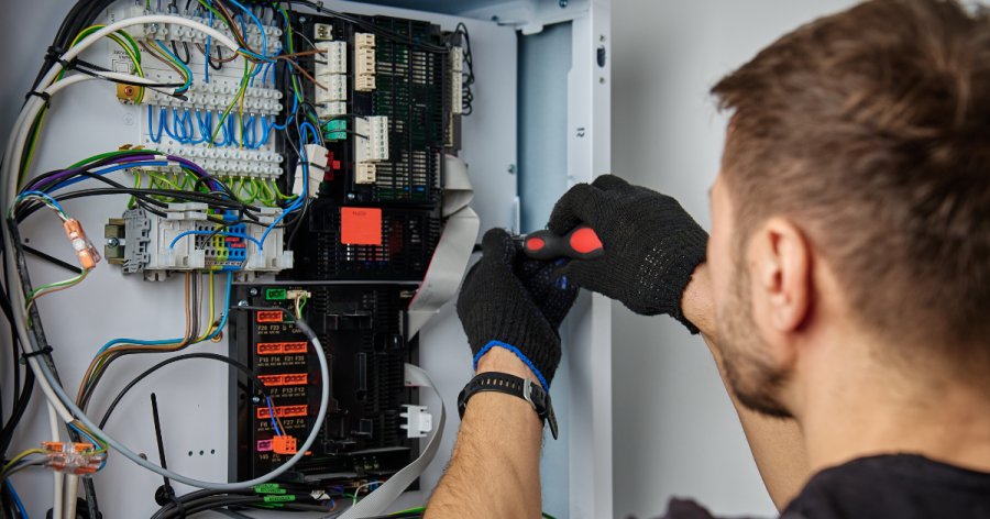 Close up of an electrical contractor working