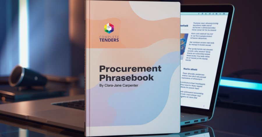 Blurred image of desk with a laptop, overlaid with a large book titled Procurement Phrasebook by Clara-Jane Carpenter